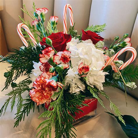 Choose from roses, lilies, tulips, orchids, carnations and more from the variety of flower arrangements in a vase, container or basket. Candy Cane Clouds St. Petersburg Florist - Bloom House ...