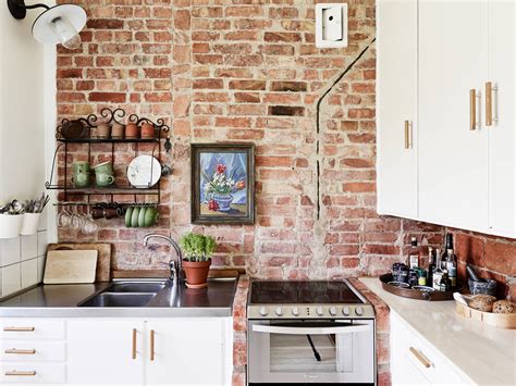 When you want a rustic kitchen, there is no better option than to include some brick elements into the design. Brick wall kitchen - COCO LAPINE DESIGNCOCO LAPINE DESIGN