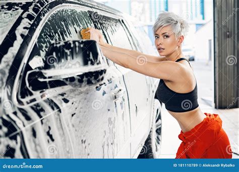 Young Woman Washes A Car In A Car Wash Stock Image Image Of Attractive Service 181110789