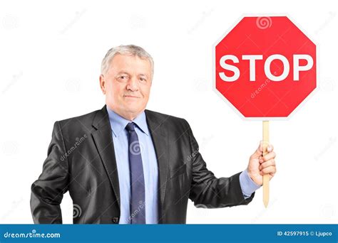 Mature Businessman Holding A Stop Sign Stock Image Image Of Caucasian