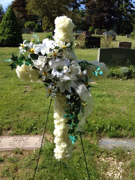 Floral arrangements for graves can be made with minimal time and effort, and often at a fraction of the cost of premade arrangements. Artificial flower cross for the cemetery | Memorial ...