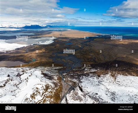 Aerial View Of The Glaciers And Snowy Mountains In Iceland Stock Photo