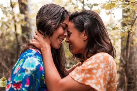 Premium Photo Lesbian Couple Embracing In Forest