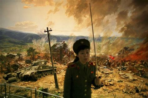 a guide gives a lecture in front of a diorama showing the korean war s 1950 battle of taejon as