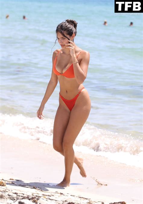 tao wickrath stuns in small orange bikini on the beach in miami 34 photos pinayflixx mega leaks