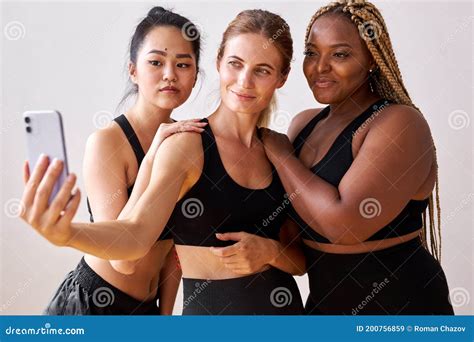 Three Young Multi Ethnic Female Models Of Different Race And Body Size