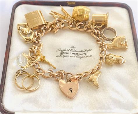 Superb Heavy Vintage 9ct Gold Charm Bracelet With 14 Gold Charms