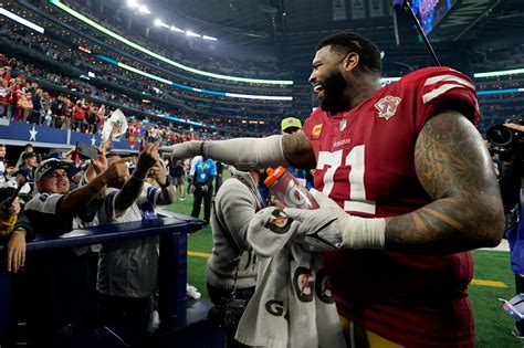 The Story Behind The Already Iconic Pic Of Trent Williams And Cowbabes Fans