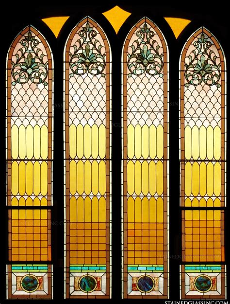 Arched Symbolism Stained Glass Window