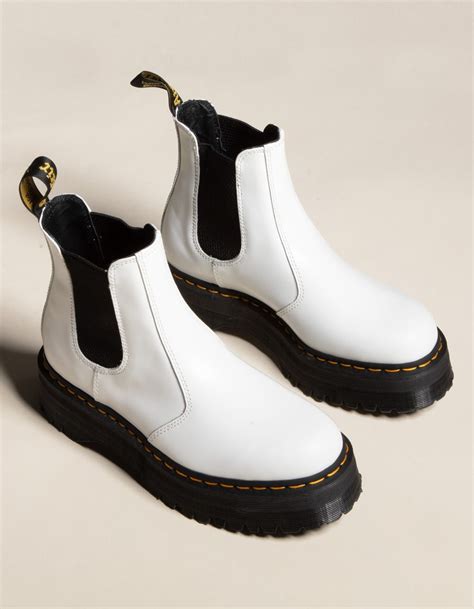 Lots of people love to customize their docs, and we've seen a ton of cool ideas, from simple things like changing out the laces for a. DR. MARTENS 2976 Quad Platform Womens Chelsea Boots ...