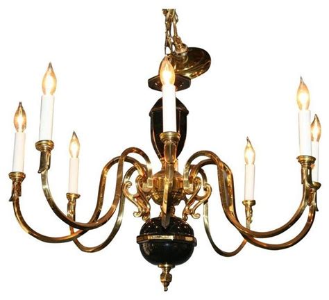 Sleek design with a multi globe and geometric body light fixture. Black & Gold Porcelain and Brass Chandelier - Modern - Chandeliers - by Chairish
