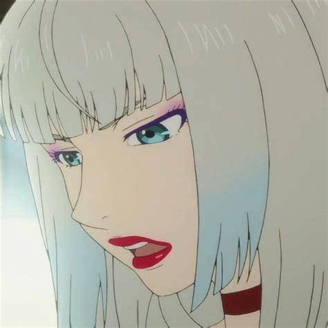 A Woman With Blue Eyes And White Hair