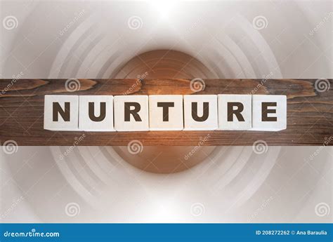 Nurture Word Written On Wooden Cubes Stock Photo Image Of Loyalty