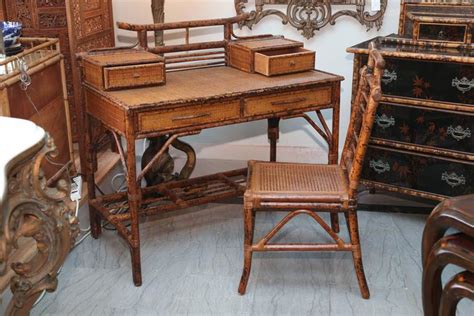 Which is the best bamboo desk for home use? Faux Bamboo and Rattan Chinoiserie Desk with Chair at 1stdibs