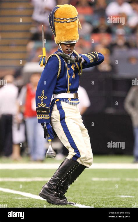 The Southern University Marching Band Drum Major Performs Before The