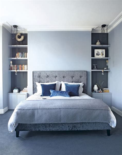 The bed is dressed in white bedding accented with pale blue pillows complementing a pale blue double gourd lamp placed on a white nightstand. Gray and Blue Bedroom Ideas: 15 Bright and Trendy Designs