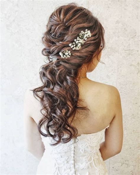 A hair tie and a couple of minutes. 27 Prettiest Half Up Half Down Prom Hairstyles for 2020