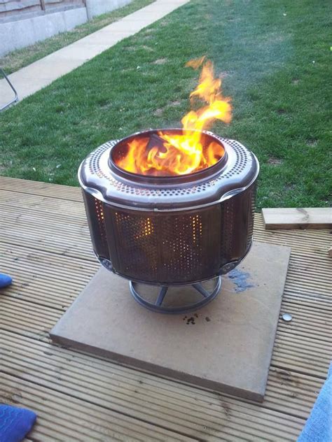 If removed carefully, without scratching the porcelain liner, it won't rust and will last for many fun family. washing machine drum fire pit | Cool Buildables. | Pinterest