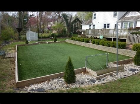 Lay a weed control membrane in strips. How to Make a Backyard Artificial Turf Field - YouTube