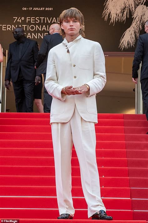 Jordan Barrett Dons A Quirky White Suit On The Cannes Film Festival Red