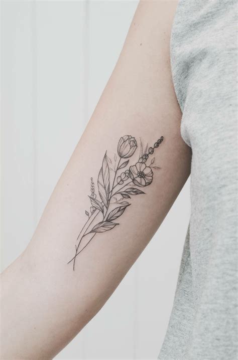 A sleeve looks just as pretty as this tiny bouquet on model kaia gerber. Pin by Melissa on Tattoo | Bouquet tattoo, Wildflower ...