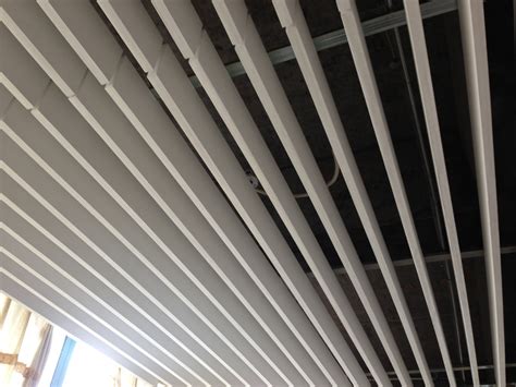 Straight acoustic ceiling baffles transform large volumes of space with owing aesthetics and acoustic performance. Sonofonic Acoustic Baffles, Clouds Ceiling - Acoustical ...