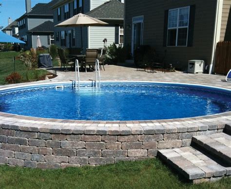 Radiant Round Semi In Ground Pool With Pavers Traditional Pools