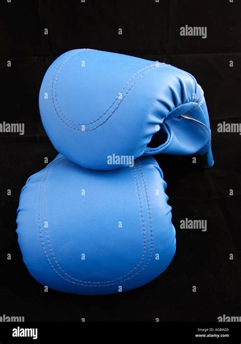 Pair Of Blue Boxing Gloves Black Background Vertical Bapdb8186 Stock