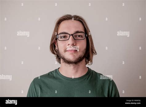 Young College Student Guy Looking At Camera Portrait Of Smiling Young