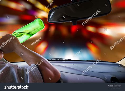 Man Drinking While Driving Stock Photo 329931134 Shutterstock