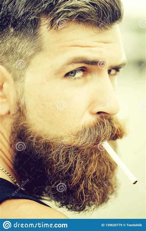 Frown Bearded Man Smoking Cigarette Stock Image Image Of Adult Beard