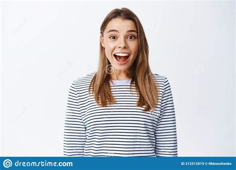 Portrait Of Surprised And Excited Blond Girl Open Mouth Fascinated