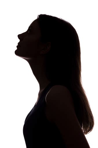 Young Woman Looking Up Vertical Silhouette Stock Photo Download Image