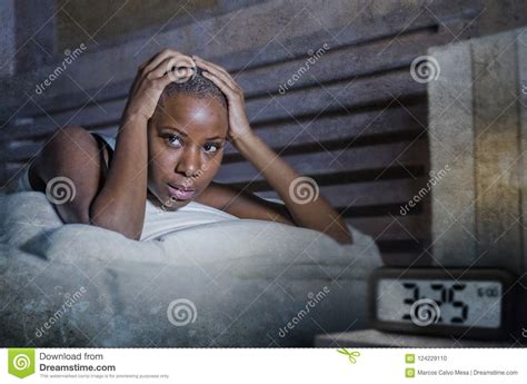 Young Sad Depressed Black Afro American Woman Awake On Bed Sleepless