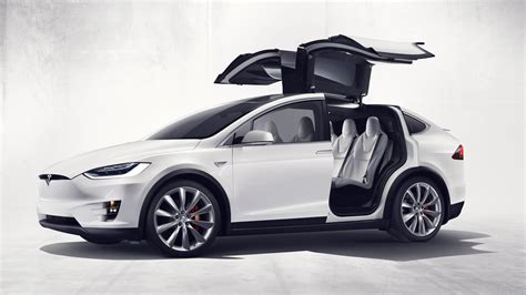 Tesla Unveils Its Model X Suv Complete With Falcon Wing Doors And Bio