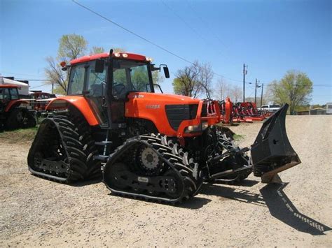 Kubota M125x With Tracks And Snow Blade For Grooming Tractors