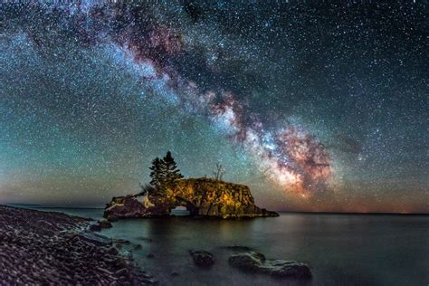Milky Way Galaxy Hovering Over Hollow Rock On Lake Superior In Northern