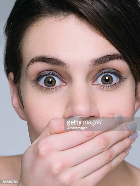 Woman Shocked Hand Over Mouth Photos And Premium High Res Pictures Getty Images