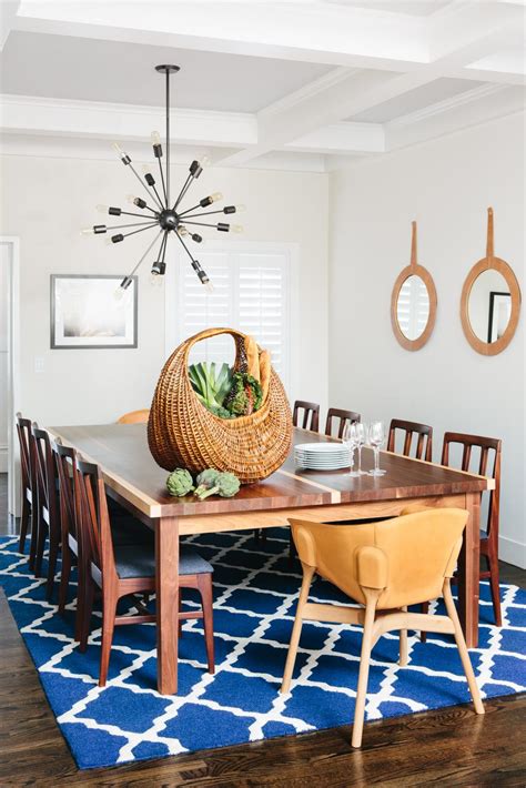 Bright Dining Room With Blue Patterned Rug Large Dining