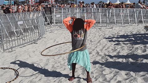 People Hula Hooping On The Beach Is Even More Mesmerizing Than We