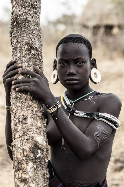Pin By Abay Tadesse On Cultural African People Mursi Tribe Woman