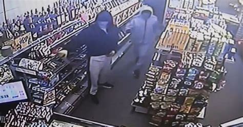 dramatic cctv captures moment knife wielding men fled in terror after plucky shopkeeper roared
