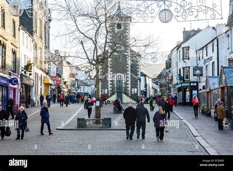 Keswick Town Centre On A Winters Day With People Out Shopping And Moot