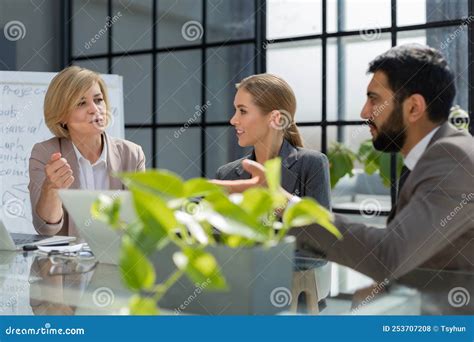 Business Meeting Manager Discussing Work With His Colleagues Stock