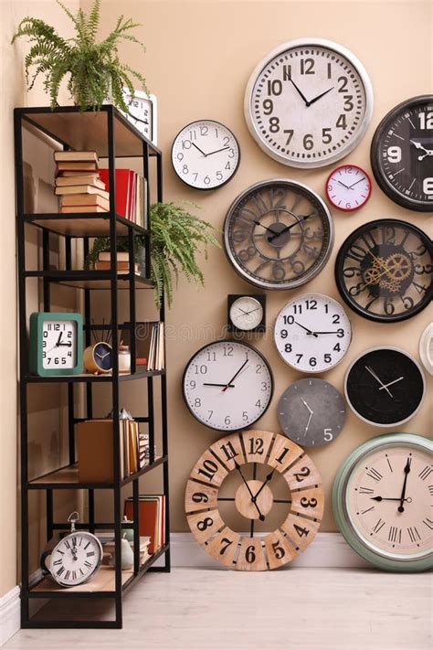 Stylish Room Interior With Collection Of Wall Clocks Stock Image