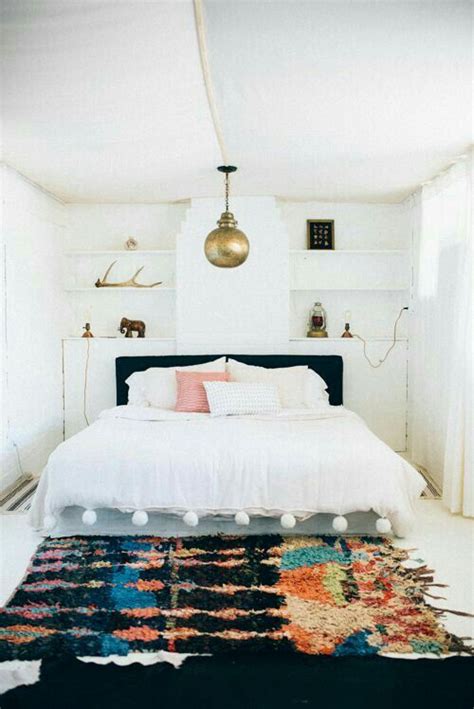 An area rug under your bed keeps your toes warm while adding color to your floor. Area Rugs: How to Tie a Room Together | Girlfriend is Better