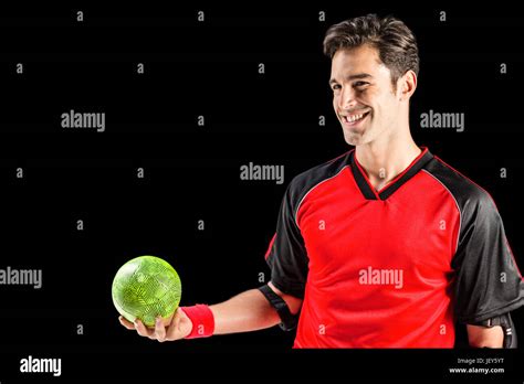 Happy Athlete Man Holding A Ball Stock Photo Alamy