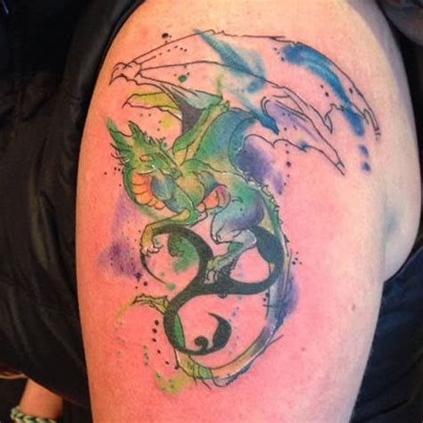 These birds really pop out because of the contrast between the black and blue colors. Watercolor Dragon Tattoo Designs, Ideas and Meaning ...
