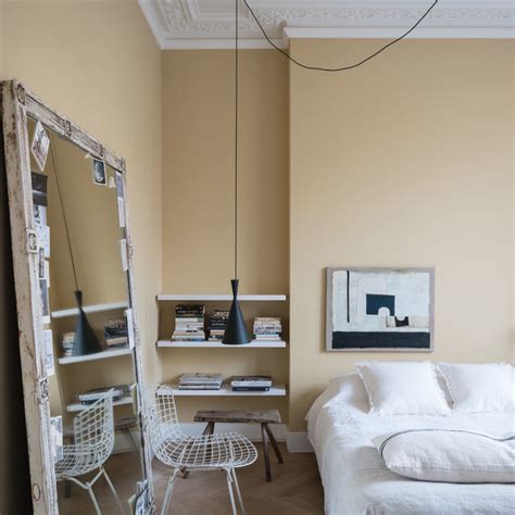 A Bedroom Painted In Hay No37 By Farrow And Ball Eclectic Bedroom