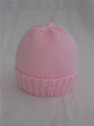 Baby beanie inspired by knight helmets with the visor up. Sea Trail Grandmas: Easy Newborn Hat Knitting Pattern